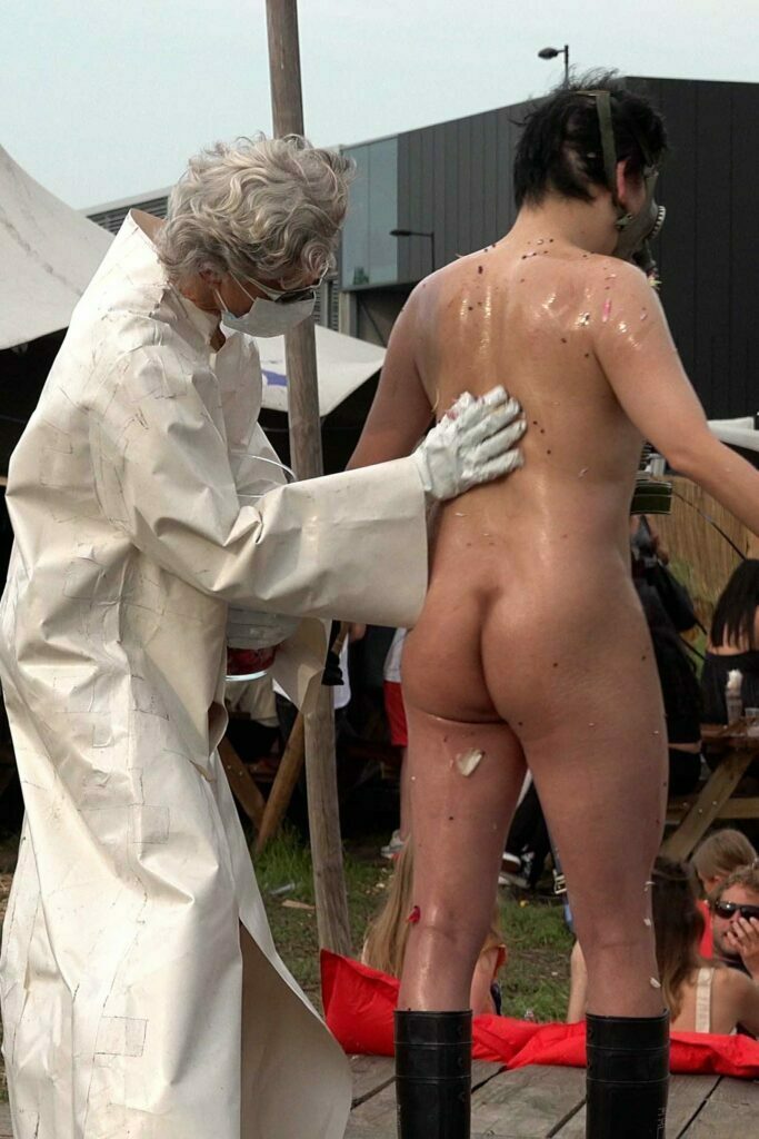 Naked Performance Art for Spiritual Healing by Ingrid Adriaans and Philemon Mukarno in AmsterdamNaked Performance Art for Spiritual Healing by Ingrid Adriaans and Philemon Mukarno in Amsterdam