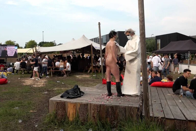 Naked Performance Art for Spiritual Healing by Ingrid Adriaans and Philemon Mukarno in Amsterdam