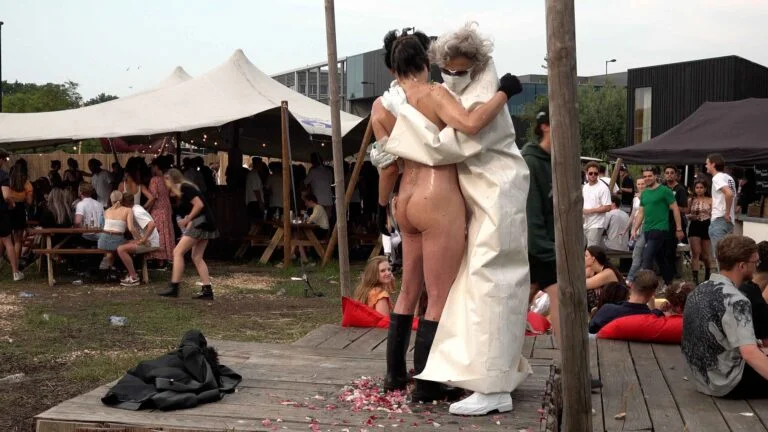 Naked Performance Art for Spiritual Healing by Ingrid Adriaans and Philemon Mukarno in Amsterdam