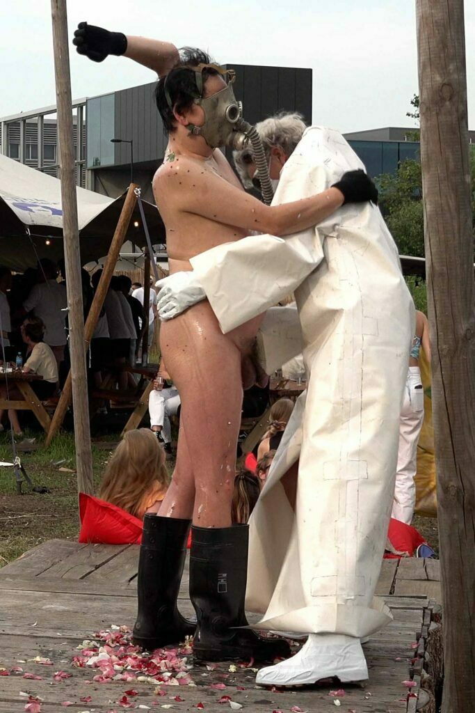Naked Performance Art for Spiritual Healing by Ingrid Adriaans and Philemon Mukarno in Amsterdam