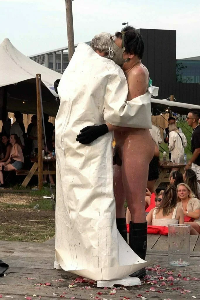 Naked Performance Art De-Coronasation for Spiritual Healing by Ingrid Adriaans and Philemon Mukarno in Amsterdam