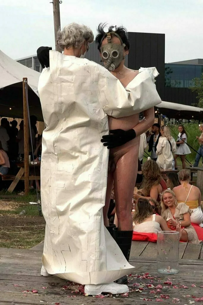 Naked Performance Art De-Coronasation for Spiritual Healing by Ingrid Adriaans and Philemon Mukarno in Amsterdam