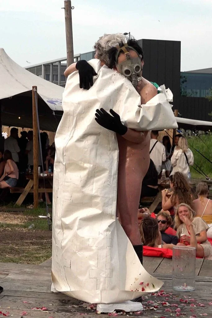 Naked Performance Art De-Coronasation for Spiritual Healing by Ingrid Adriaans and Philemon Mukarno in Amsterdam