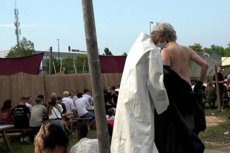 Naked Performance Art for Spiritual Healing by Ingrid Adriaans and Philemon Mukarno in Amsterdam