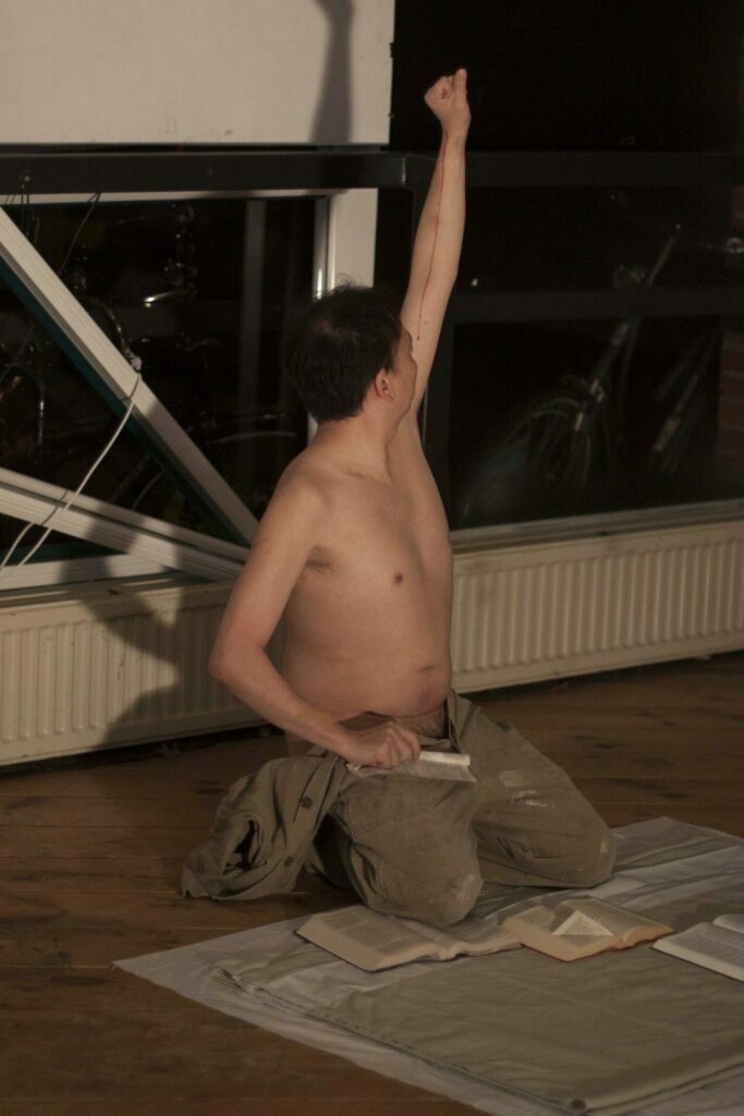Philemon Mukarno Performance Art Easter Christmas (2017)’20 Podium @ IDFX Kunst Drift Collectief 2.0, Breda,Netherlands