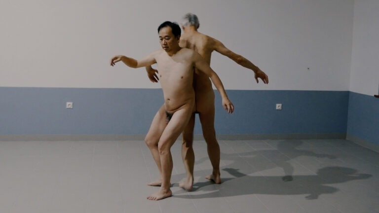 Philemon Mukarno and Thomas Zollinger does a naked performance art