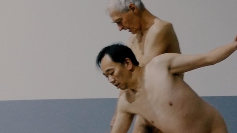 Philemon Mukarno and Thomas Zollinger does a naked performance art