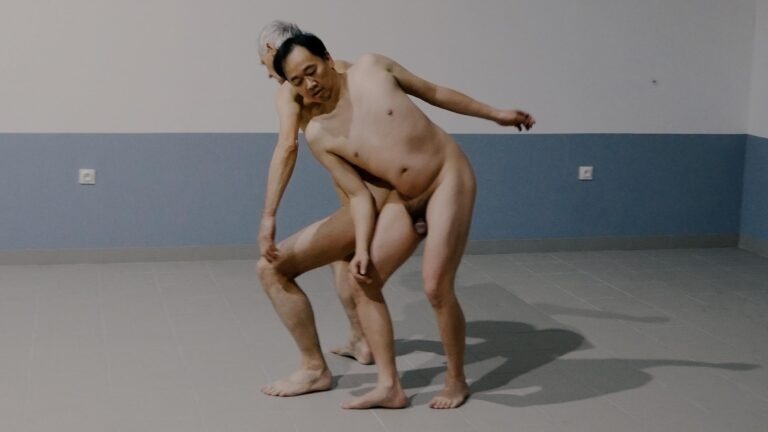 Philemon Mukarno and Thomas Zollinger does a naked performance art