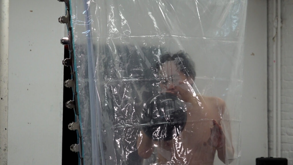 Philemon Mukarno bleeding and naked inside the plastic bag suffocating