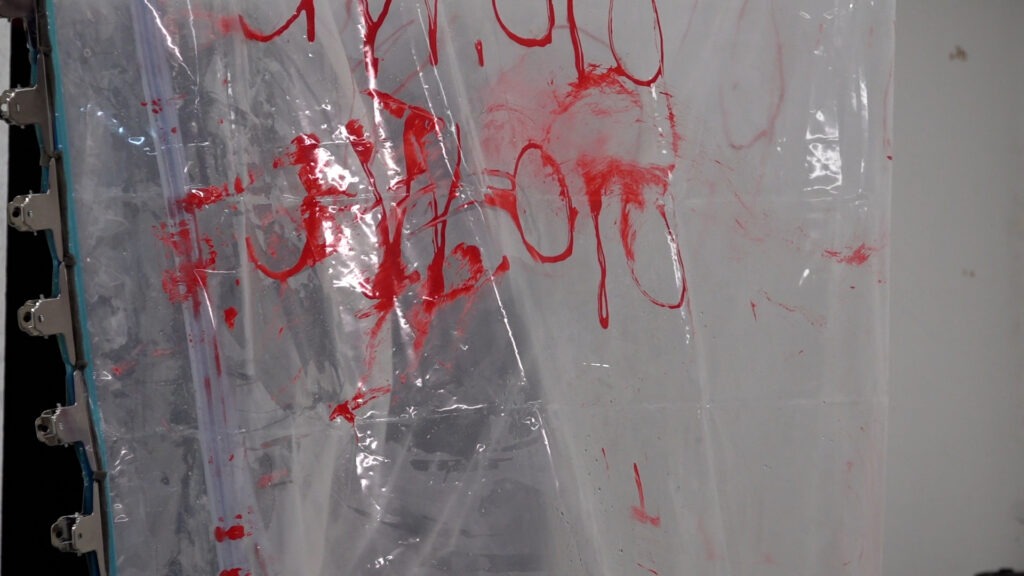 Philemon Mukarno bleeding and naked inside the plastic bag suffocating
