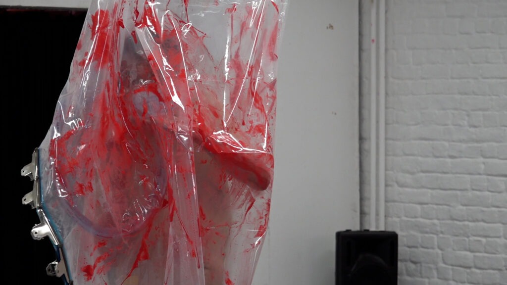 Philemon Mukarno bleeding and naked inside the plastic bag suffocating