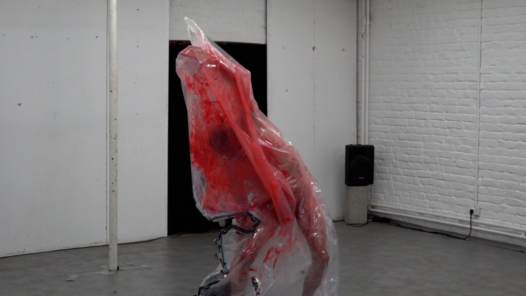 Philemon Mukarno bleeding and naked inside the plastic bag suffocating