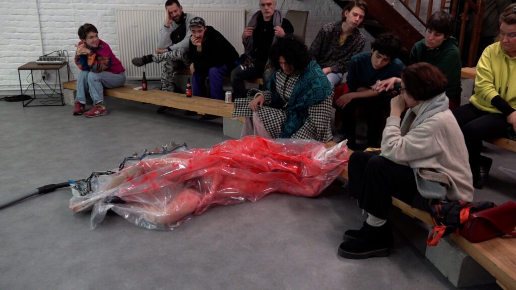 Philemon Mukarno bleeding and naked inside the plastic bag suffocating