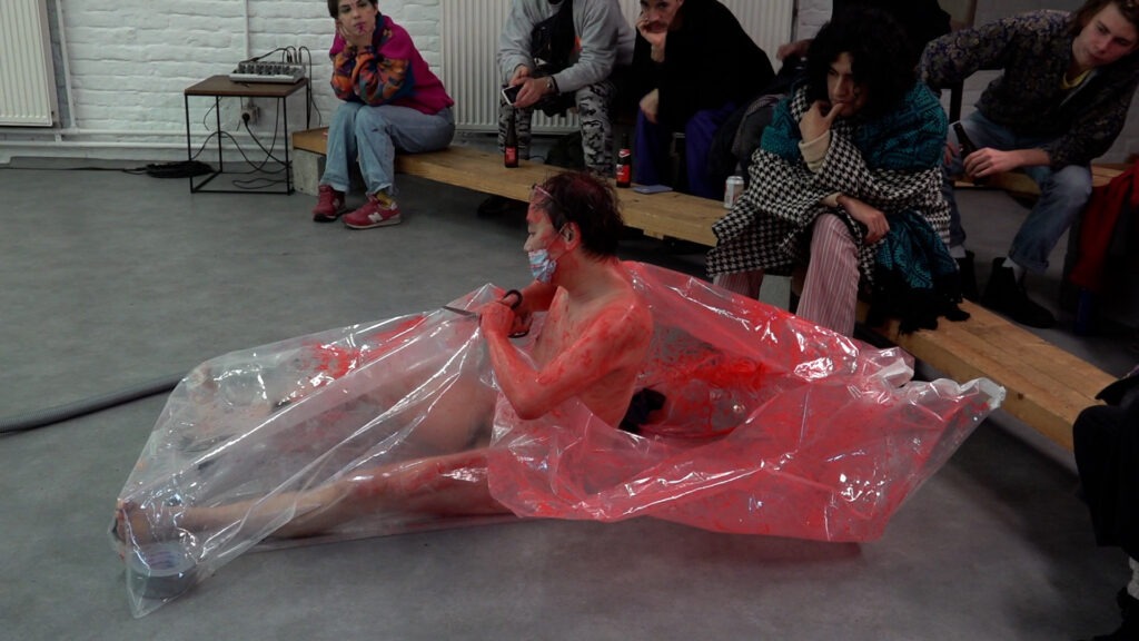 Philemon Mukarno bleeding and naked inside the plastic bag suffocating