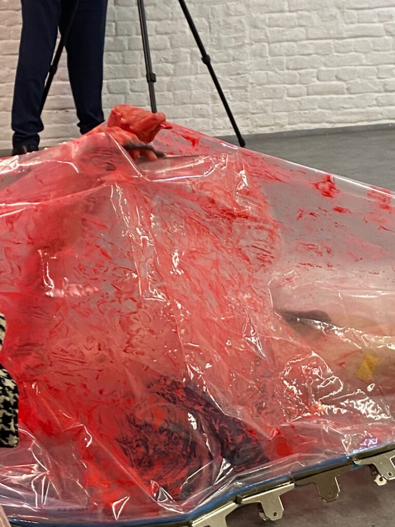Philemon Mukarno bleeding and naked inside the plastic bag suffocating