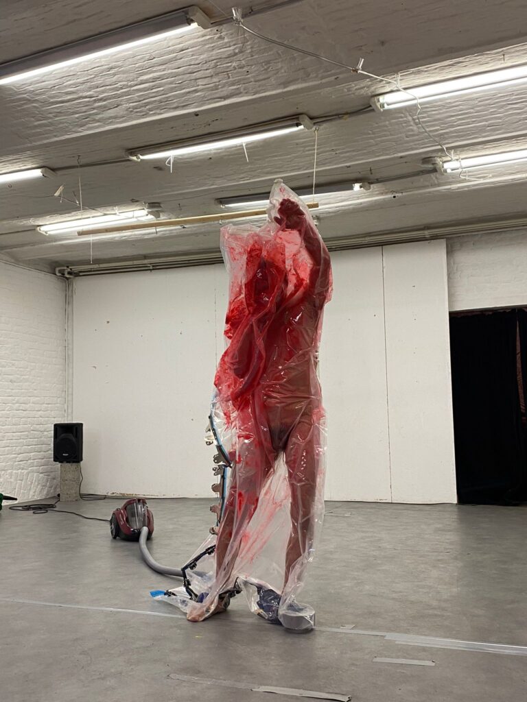 Philemon Mukarno bleeding and naked inside the plastic bag suffocating