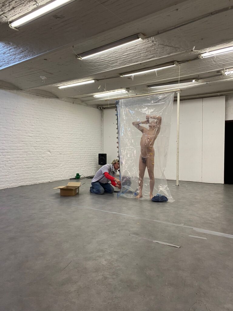 Philemon Mukarno bleeding and naked inside the plastic bag suffocating
