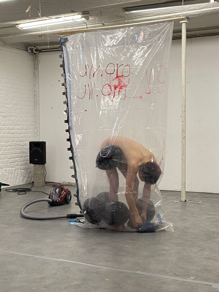 Philemon Mukarno bleeding and naked inside the plastic bag suffocating