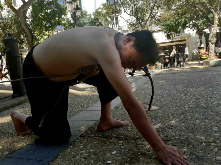 Performance by Philemon Mukarno during International Territori performance art festival Ibiza / Spain III edition 17/25 September 2022 Plaza Vara de Rey, Eivissa. About The decolonization of a country is a profound spiritual journey that echoes the ancient rhythms of liberation and awakening.