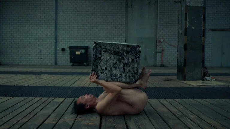 Philemon Mukarno doing a Naked Performance in Swiss