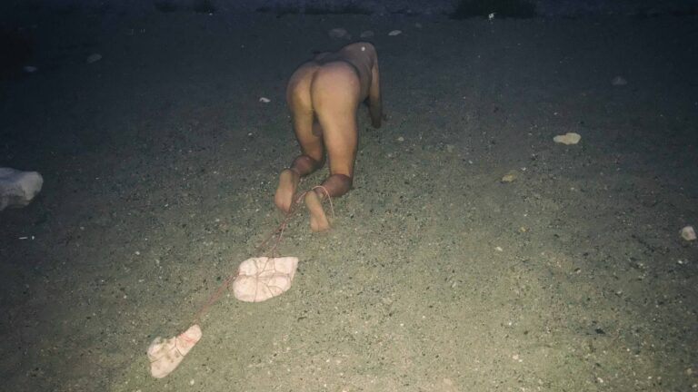nude man Dragging Stones