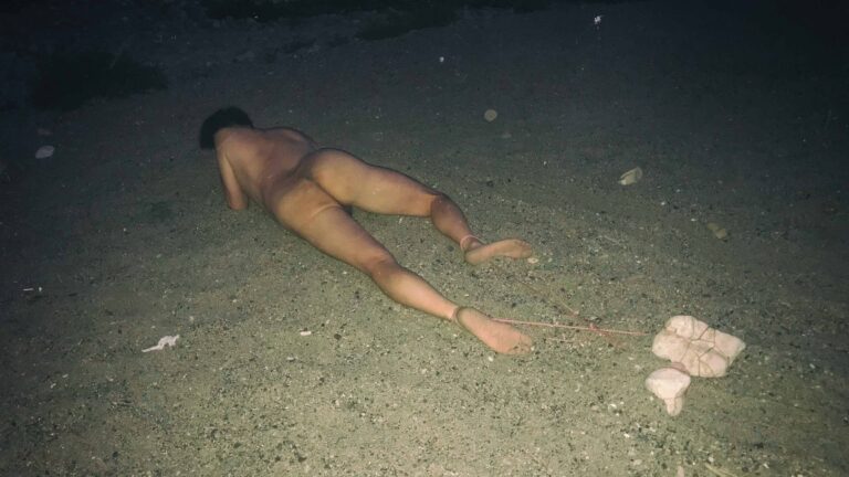 nude man Dragging Stones