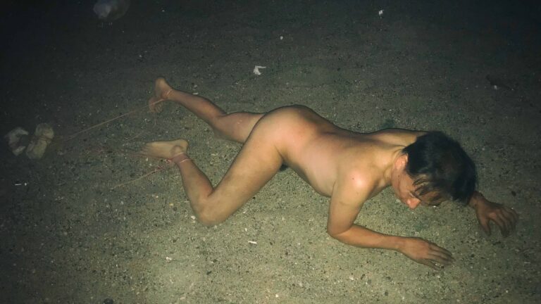 nude man Dragging Stones