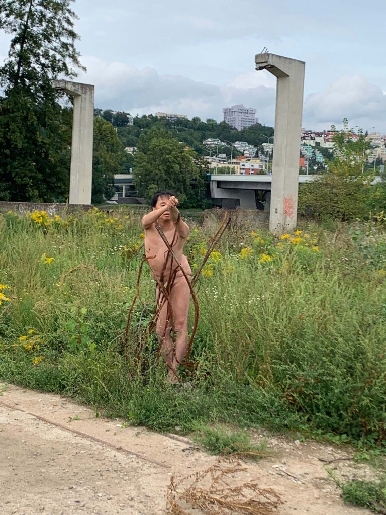 Philemon Mukarno performance artist perform Naked as Trans 9th Festival of Naked Forms in Prague
