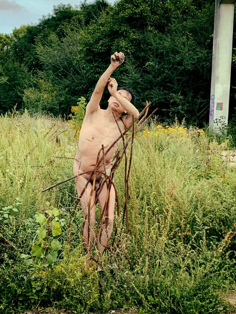 Philemon Mukarno performance artist perform Naked as Trans 9th Festival of Naked Forms in Prague