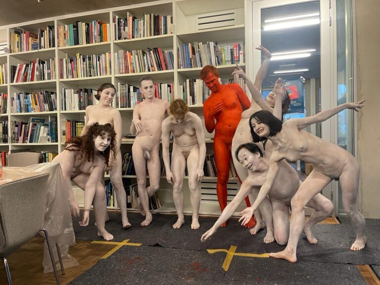 Friction naked performance at Kunsthal Rotterdam with Philemon Mukarno, Antti Uimonen, Diana Mare, Lois de Bondt, Mar Esteban Martin, Noemi Calzavara, Ryan O’Shea, and Issy BaylisFriction naked performance at Kunsthal Rotterdam with Philemon Mukarno, Antti Uimonen, Diana Mare, Lois de Bondt, Mar Esteban Martin, Noemi Calzavara, Ryan O’Shea, and Issy Baylis.