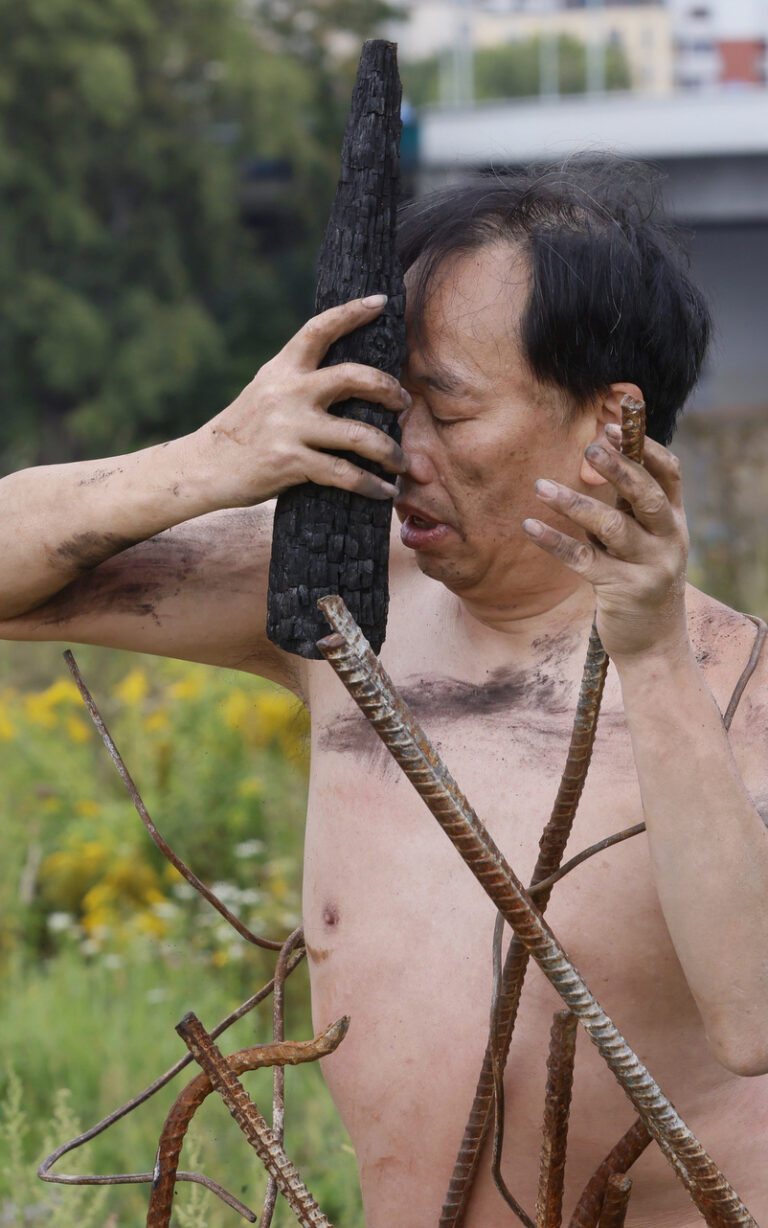 Philemon Mukarno performance artist perform Naked as Trans 9th Festival of Naked Forms in Prague