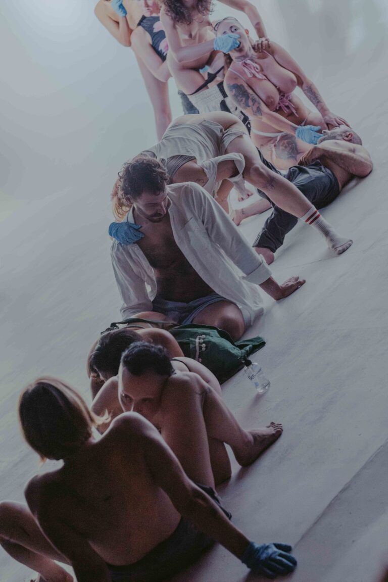 Naked abstract moving figures in pink and blue